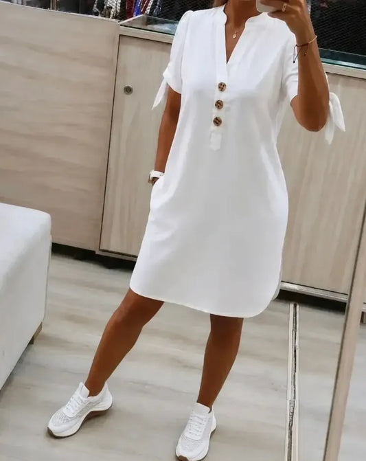 Loose-fitting, flattering, straight-cut midi shirt dress with side pockets