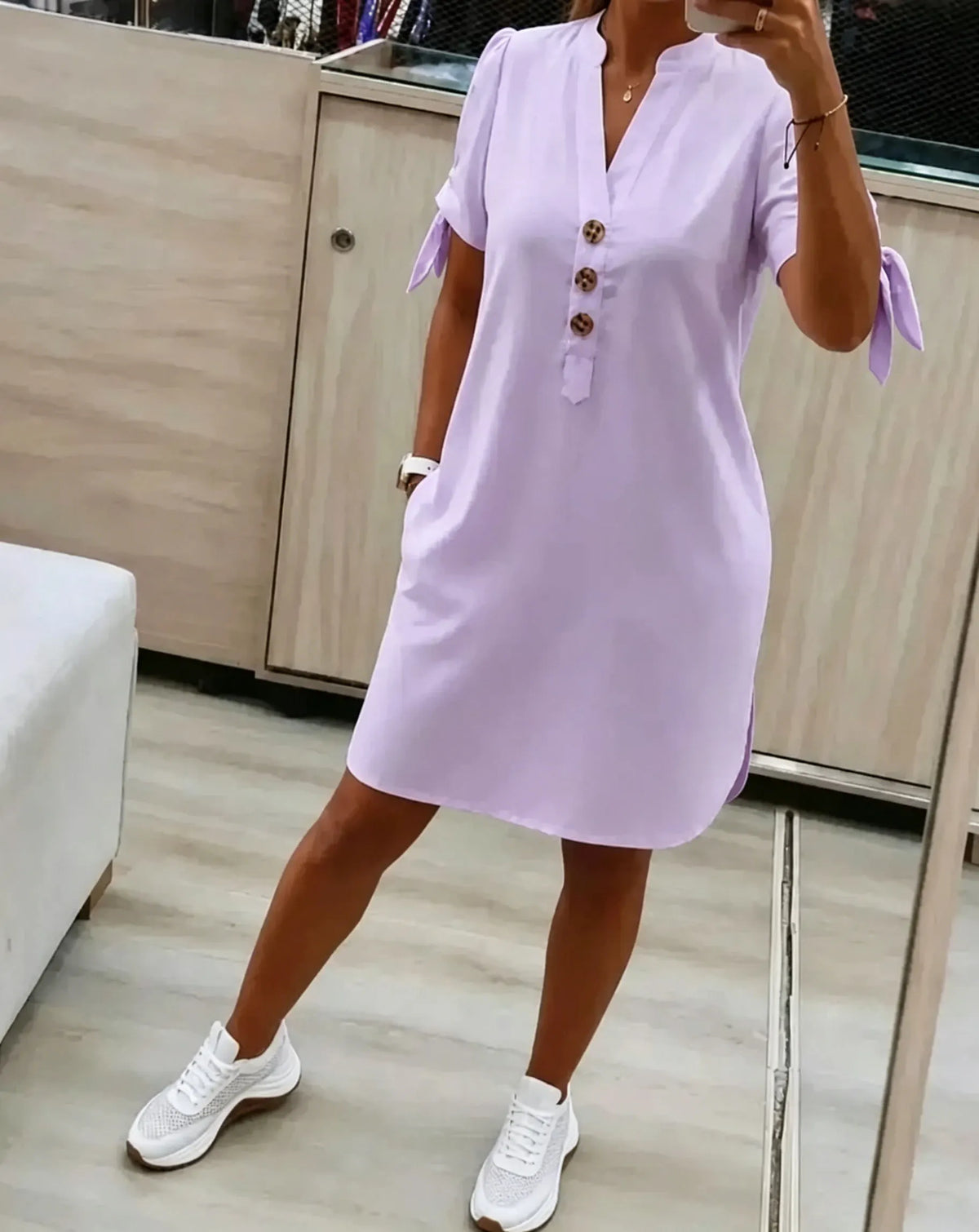 Loose-fitting, flattering, straight-cut midi shirt dress with side pockets