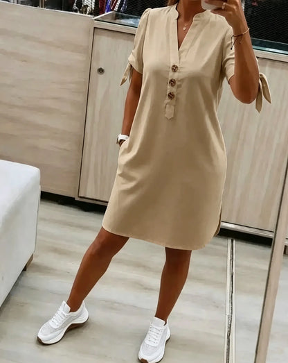 Loose-fitting, flattering, straight-cut midi shirt dress with side pockets